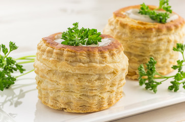 Freshly baked vol-au-vents with mushroom filling