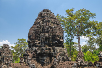 Obraz premium Anciente stone heads in Bayon temple in Angkor Wat, Cambodia.