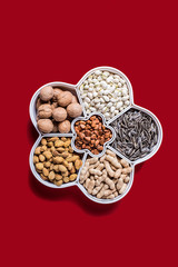Chinese New Year still life with nuts in fruit bowl
