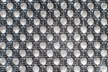 Texture of a porous cloth macro photo