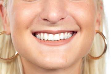 Closeup of blonde woman smiling