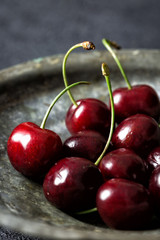 Cherries in a vintage bowl close up