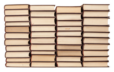 Stacks of old books with yellowed pages isolated on white background. Library or bookstore concept.