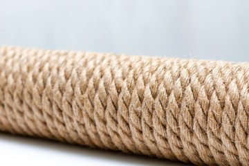 Beige cat scratching post. Selective focus, macro close-up