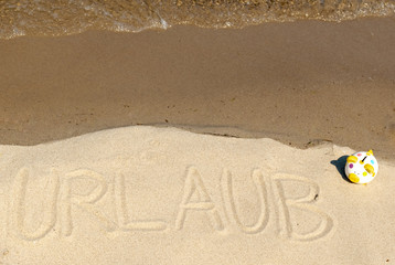 Botschaft im Sand - Urlaub