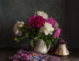 Still life with white and pink peonies.