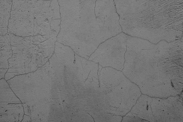 Texture, wall, concrete, it can be used as a background . Wall fragment with scratches and cracks