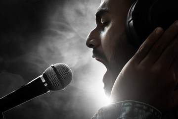 Singer singing with microphone