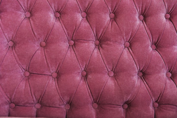 Red sofa texture seamless pattern. Pink fabric sofa texture