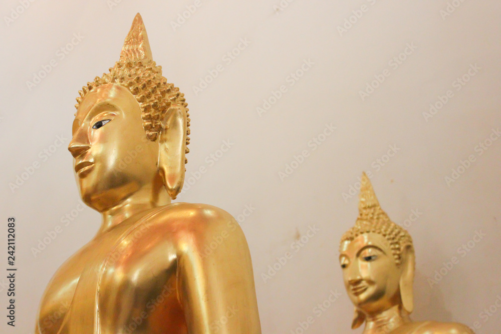 Wall mural gold buddha statue in thailand temple