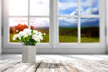 Table background of spring time and window space 