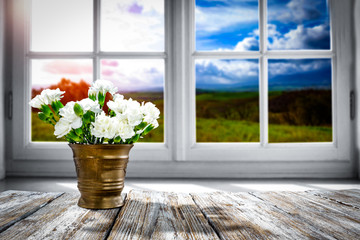 Table background of spring time and window space 