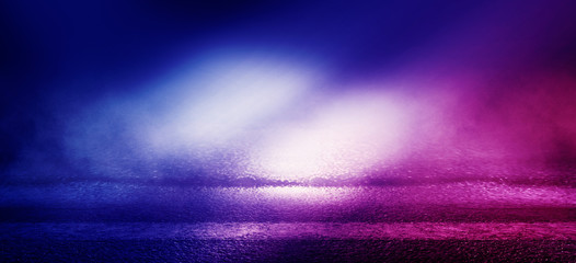 The background of wet asphalt, the reflection of the night lights of the city, neon pink light, smoke