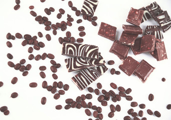 close up.set of chocolate bars and coffee beans. isolated on whi