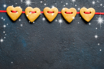 Valentine's day greeting card with gingerbread cookies in the shape of a heart.