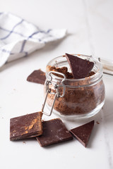 cocoa and dark chocolate on a white background.