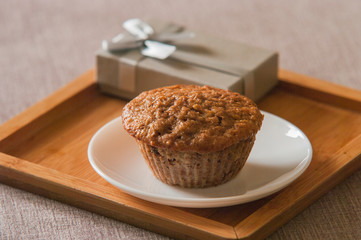 Tasty cupcake on table in kitchen