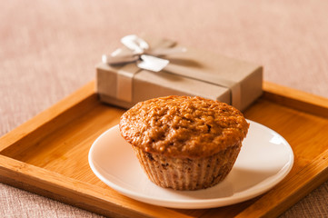 Tasty cupcake on table in kitchen