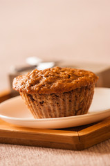 Tasty cupcake on table in kitchen