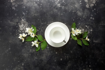 Obraz na płótnie Canvas Tea and the blossoming jasmine