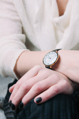 Wristwatches on women's hand