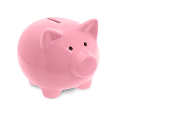 Ceramic pink piggy bank on white background