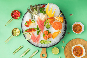 Seafood sashimi with ice ready for hot pot