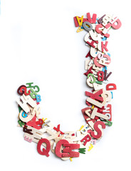 Colorful wood alphabet letters on white background,letter J