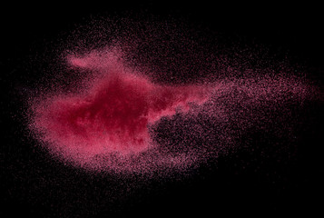 Red Sand explosion isolated on over dark background,Abstract sand cloud,Motion blur