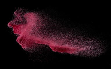 Fototapeta na wymiar Red Sand explosion isolated on over dark background,Abstract sand cloud,Motion blur