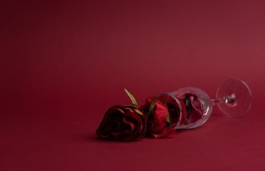 Wineglass with red roses. Happy Valentine's day
