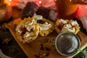 Christmas cookies and decorations on table