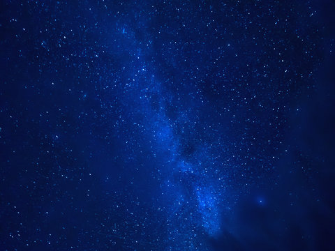 Milky Way star tracks. Starry night sky in cloudy weather. View from Kenozersky National Park, Arkhangelsk region, Russia.