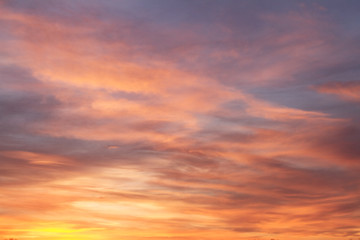 Fototapeta premium Beautiful fabulous winter orange-blue sunset outside the city.