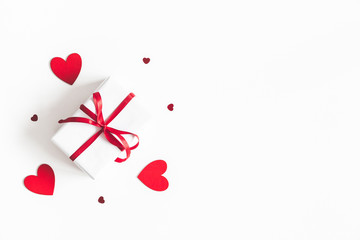 Valentine's Day background. Gift box on white background. Valentines day concept. Flat lay, top view, copy space