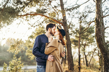 Happy young romantic couple spend time together outdoor.