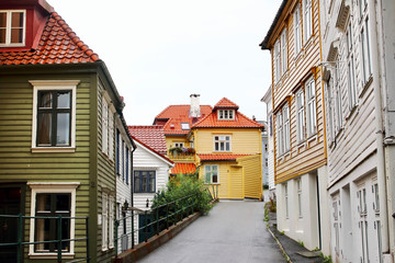 Several typical  colorful houses close to Floyen park and Bryggen neighborhood in the beautiful city of Bergen, Norway.