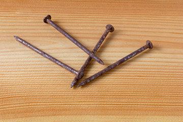 Close up texture of old rusty nails, Rusty nails on a wooden table