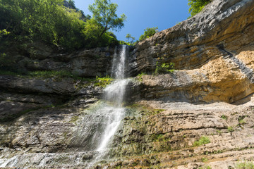 Fototapeta premium Landscape with Waterfall Skaklya near villages of Zasele and Bov at Vazov trail, Balkan Mountains, Bulgaria