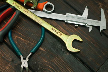 Repair modern tools on wooden background top