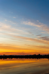 colorful dramatic sky with cloud at sunset.