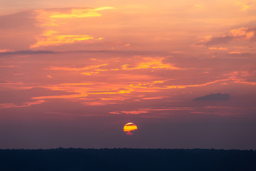 colorful dramatic sky with cloud at sunset.