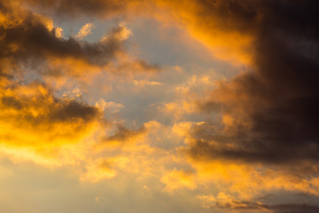 colorful dramatic sky with cloud at sunset.