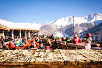Winter table background in Alps and mountains landscape 
