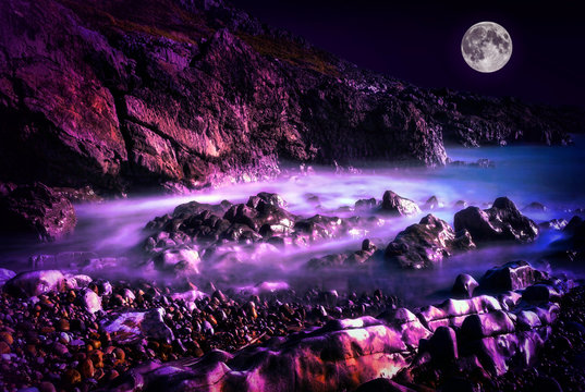 Bracelet Bay With A Long Exposure At Night With A Full Moon At The Mumbles On The Gower Peninsular West Glamorgan Wales UK