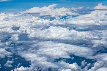 Flying above a dense layer of white clouds. Great and beautiful clouds. 