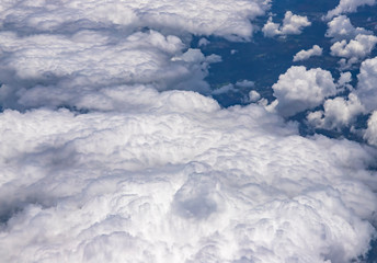 Flying above a dense layer of white clouds. Great and beautiful clouds. 