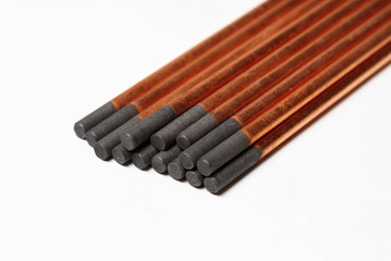 copper coated carbon electrodes for copper and bronze welding. on white background