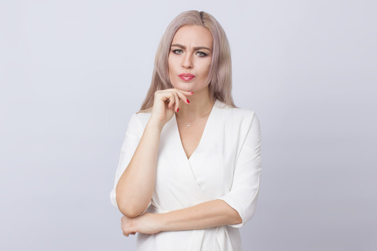 Woman thinking and looking to cam