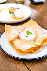 crispy roti with milk and white chocolate sauce